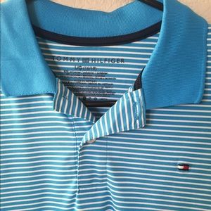 Blue and white striped golf shirt